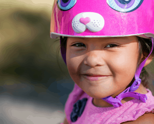 girl in pink helmet header